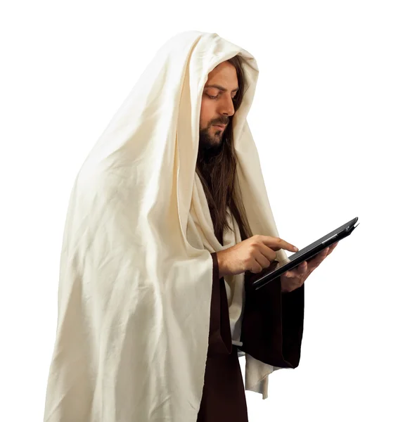 Jesus nutzt die Tablette — Stockfoto