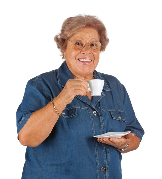 Happy elderly woman drinking coffee — Stock Photo, Image