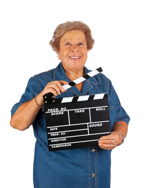 Elderly woman with clapper board — Stock Photo, Image