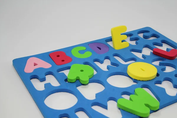 Puzzle alfabeto colorato schiuma . — Foto Stock