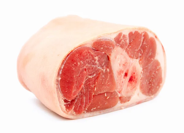 Uncooked ham / gammon joint with skin on against white backgroun — Stock Photo, Image