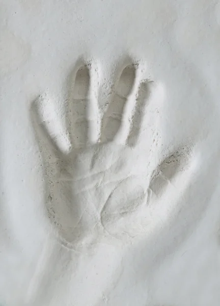 Hand imprint in clay — Stock Photo, Image