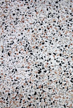 oppervlak van natuurlijke grijze gevlekte steen als achtergrond