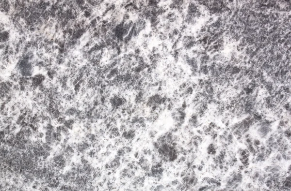 Ytan av naturliga grå fläckig sten som bakgrund — Stockfoto