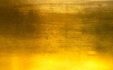 Altın cilalı metal desen soyut arkaplan.