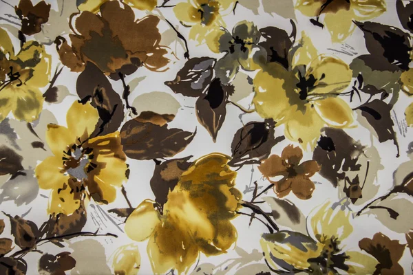 Fabric of different colors with a pattern of flowers Stock Photo