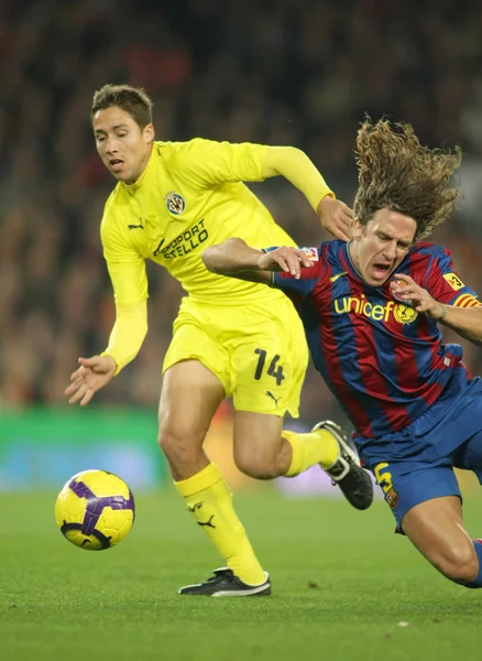 Villarreal ve Puyol (L) Barselona Fuster (R) — Stok fotoğraf