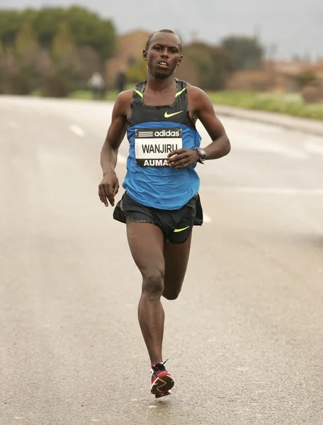 Mistr olympijského maratonu v Pekingu 2008, samuel wanjiru — Stock fotografie