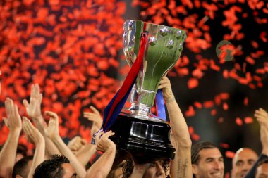 FC Barcelona's players hold up La Liga trophy