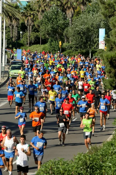 Runners on the popular race of the Olympic Village — Stock Photo, Image