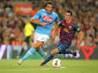 Salvatore Aronica(L) of SSC Napoli followed by Ignacio Cuenca clipart