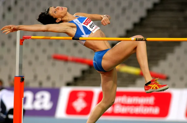 Ruth Beitia af Spanien hoppe på Hight hoppe - Stock-foto