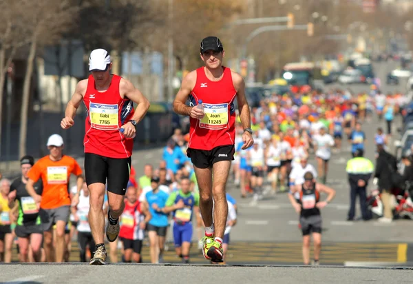 Barcelona street crowded of athletes running — Stock Photo, Image