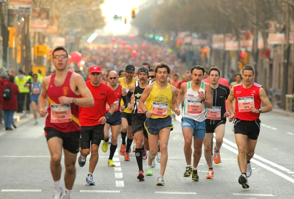 Barcelona Straße voller Athleten Stockbild