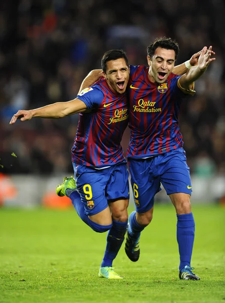 Alexis sanchez i xavi hernandez z fc barcelona — Zdjęcie stockowe