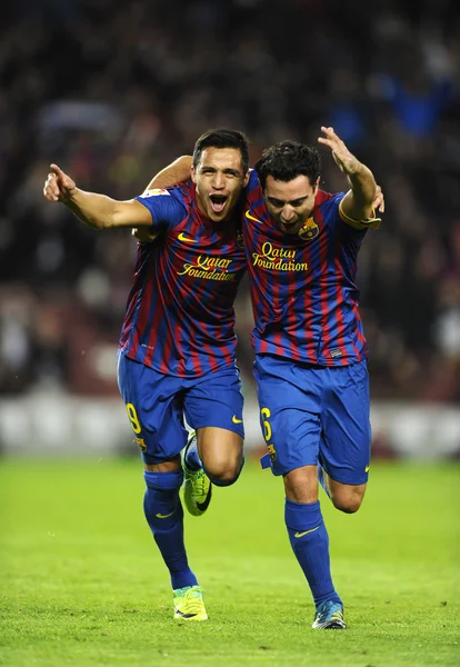 Alexis Sanchez and Xavi Hernandez of FC Barcelona — Stock Photo, Image