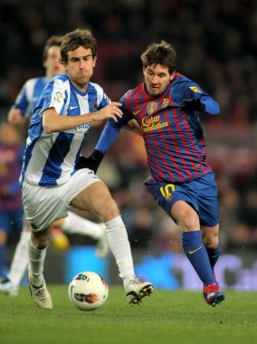 Mikel Gonzalez(L) Real Sociedad, Fc Barcelona ile Leo Messi(R) VIES