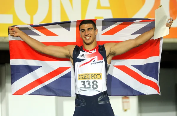 Adam Gemili da Grã-Bretanha celebra o ouro em 100 — Fotografia de Stock