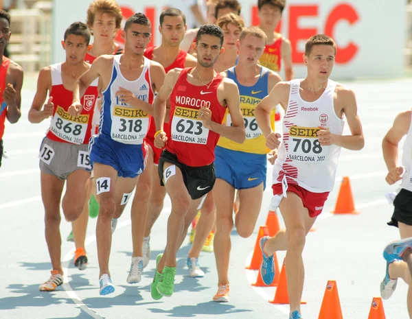 Konkurrenter på 3000m steeplechase begivenhed - Stock-foto