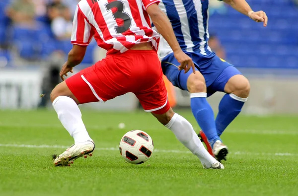 Gambe giocatore di calcio in azione — Foto Stock