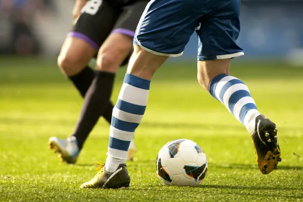 Two soccer players vie — Stock Photo, Image