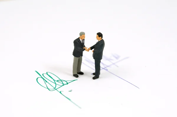 Hand shake and contract — Stock Photo, Image
