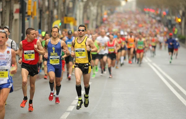 Barcelona street crowded of athletes — Stock Photo, Image