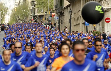 Barcelona street crowded of athletes clipart