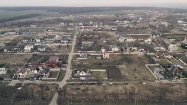 Construction of a new residential quarter outside the city: private construction on land plots.