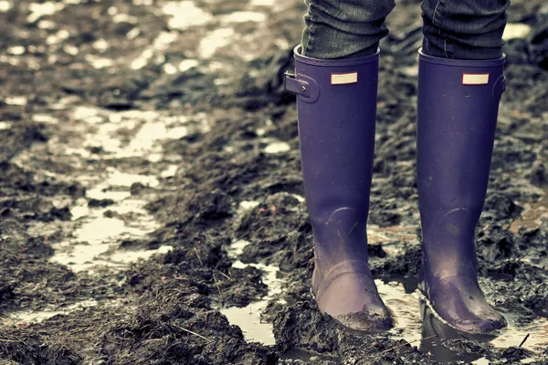 Boots in the mud — Stock Photo, Image