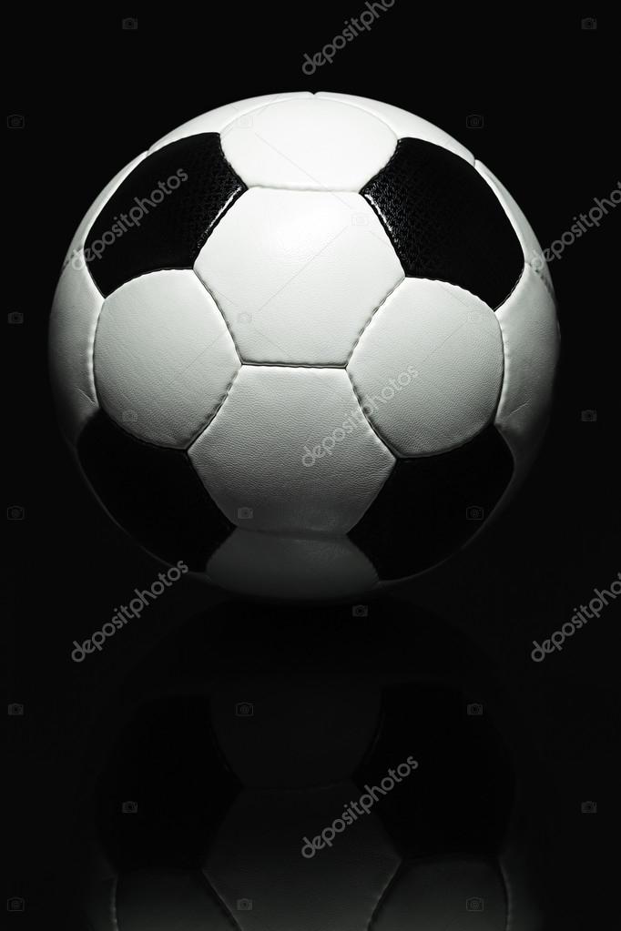 Shot of a traditional Football (Soccer Ball) with its distinctive black and white pattern. This pattern is not a logo or trademark. There are no manufacturers logo's on the ball.