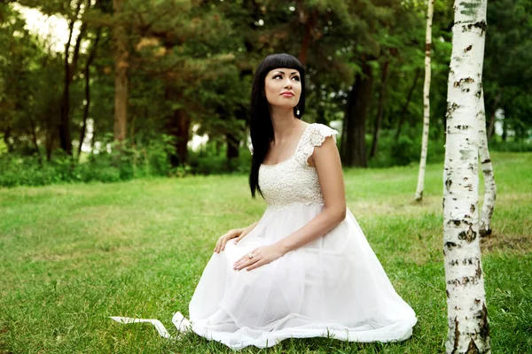 Beautiful woman in white dress — Stock Photo, Image