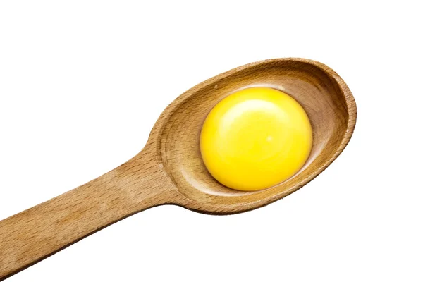 Spoon with yolk inside — Stock Photo, Image