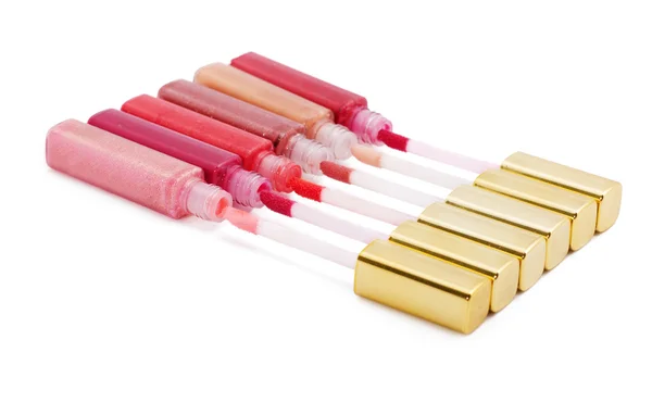 Set of coloured lip glosses isolated on white — Stock Photo, Image