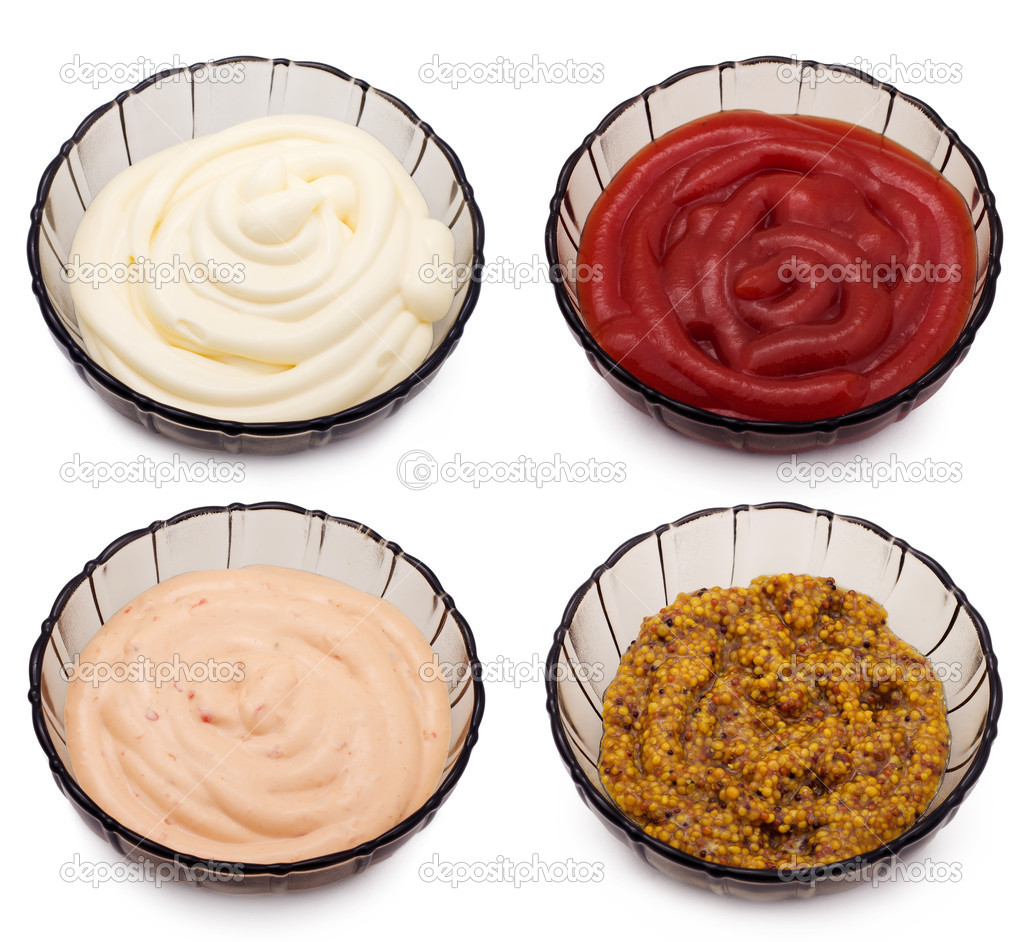 Ketchup, mayonnaise, french mustard and paprika sauce in bowls i