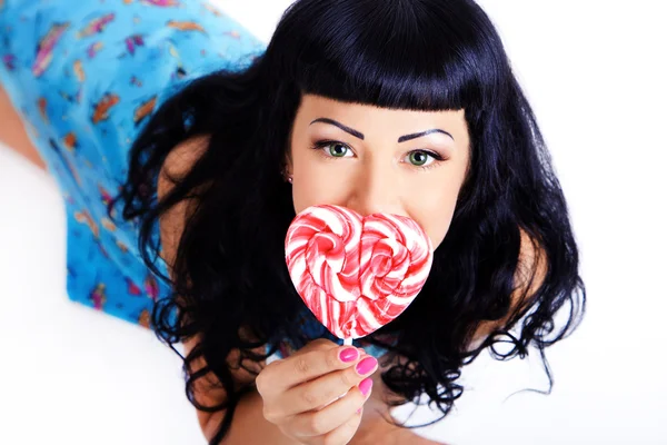 Young woman with candy — Stock Photo, Image