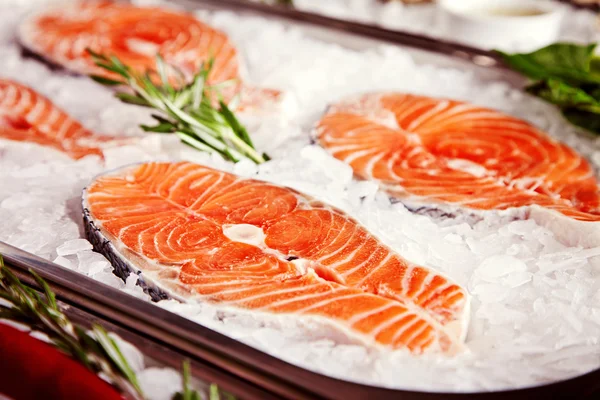 Fillet of salmon in ice — Stock Photo, Image