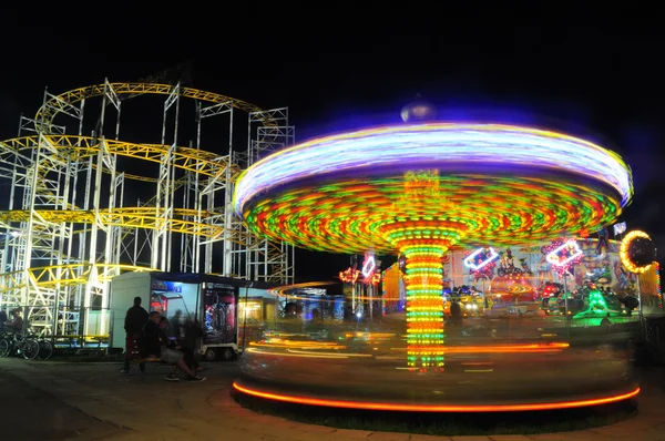 Amusement park in the evening — Stock Photo, Image