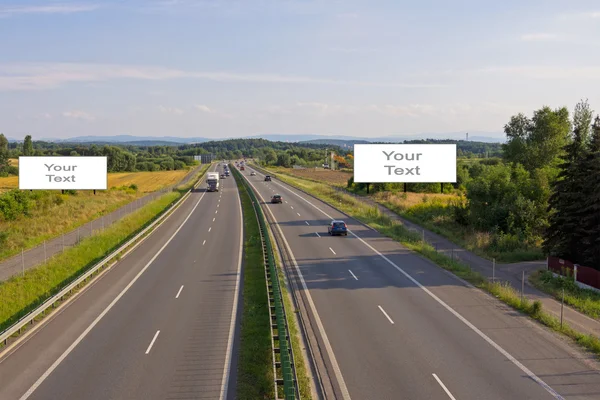 Dos carteles en la carretera — Foto de Stock