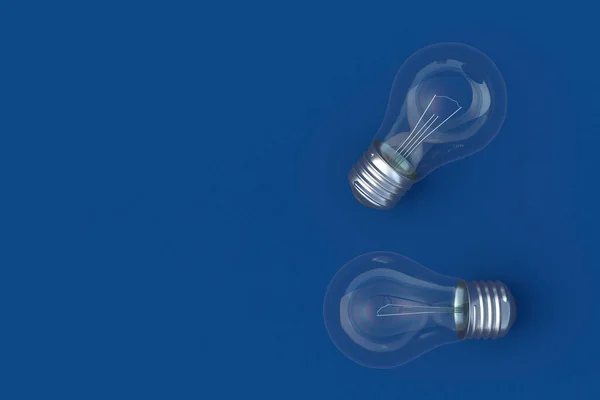 Deux Ampoules Sur Fond Bleu Vue Dessus Espace Copie Rendu — Photo