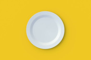 Sarı arka planda boş bir plaka. Üst Manzara. 3d hazırlayıcı