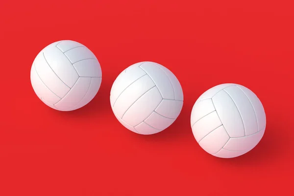 Three Volleyball Balls Red Background Sports Equipment International Tournament Championship — Stockfoto