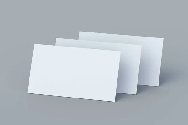 Blank business cards on gray background. 3d render