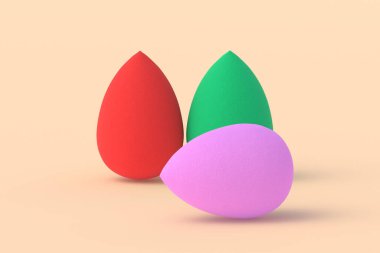 Bej arka planda yumurta süngeri. Kozmetik aksesuarlar. Güzellik ve moda. Makyaj aletleri. 3d hazırlayıcı