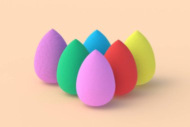 Bej arka planda yumurta süngeri. Kozmetik aksesuarlar. Güzellik ve moda. Makyaj aletleri. 3d hazırlayıcı