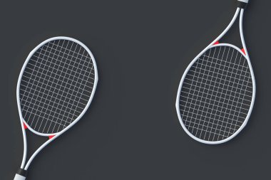 Siyah arka planda beyaz tenis raketleri. Spor malzemesi. Uluslararası turnuva. Boş zaman oyunu. En sevdiğim hobi. Uzayı kopyala Üst Manzara. 3d hazırlayıcı
