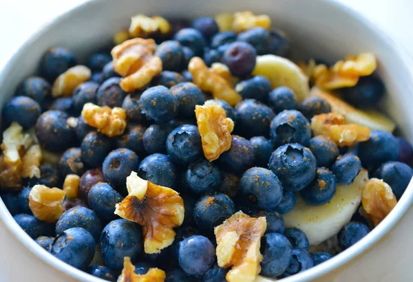 An oat cereal with blueberries, nuts and banana. Good for any project.