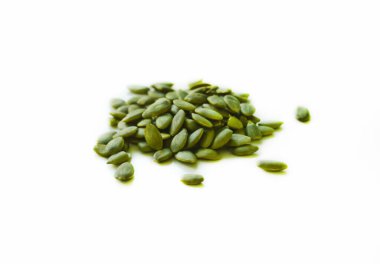 Isolated pumpkin seeds with the selective focus. Good for any project.