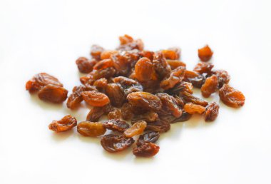 Isolated pile of raisins with the selective focus. Good for any project.