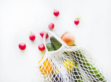 Healthy lifestyle and zero waste concept. Tote bag with vegetables with the selective focus.